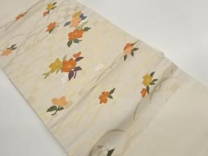 唐織松皮菱に草花・市松・芝模様織出し名古屋帯